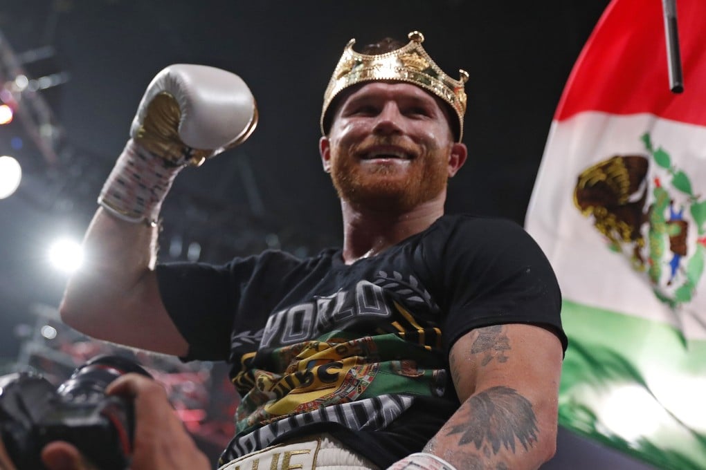 canelo with belts 0033