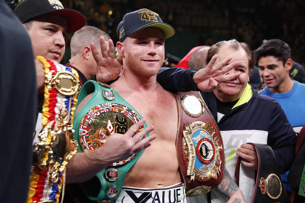 canelo with belts 0036