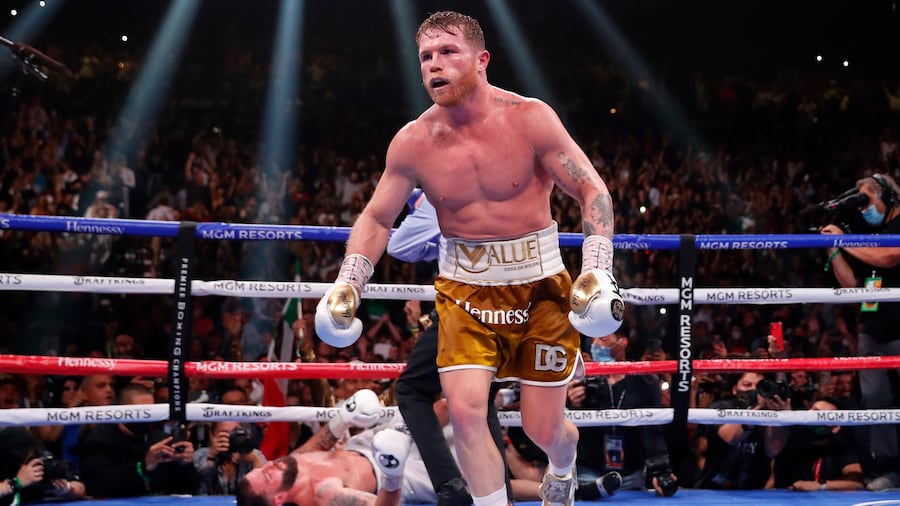 canelo with belts 0046