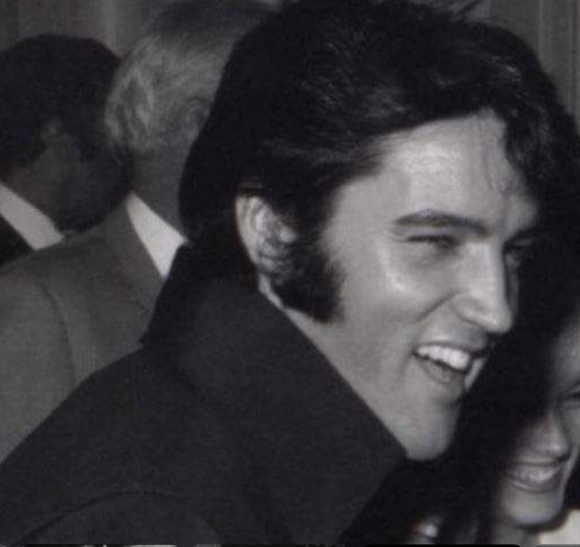 elvis smile and laugh.