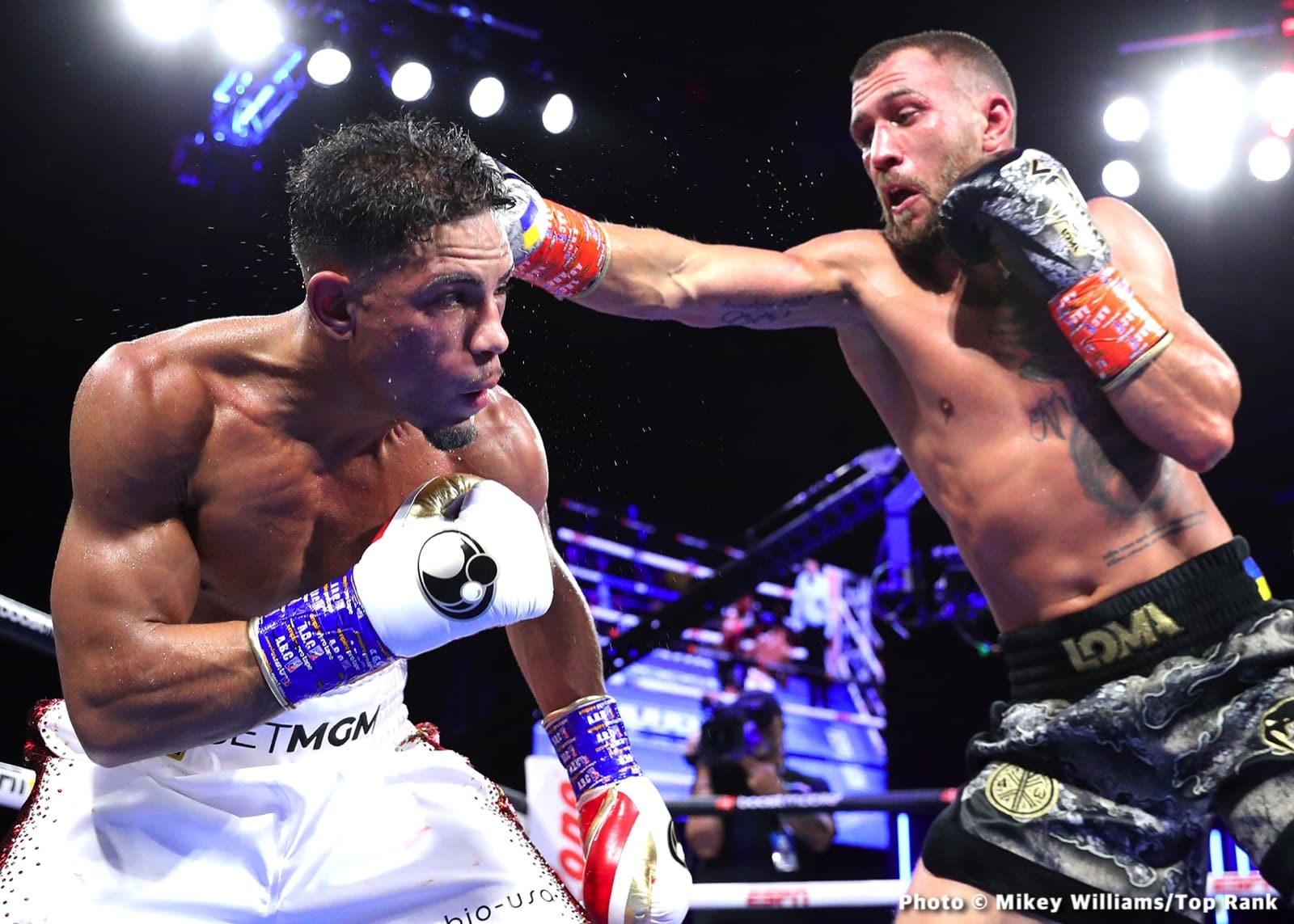 fighting style comparison Lomachenko Ortiz