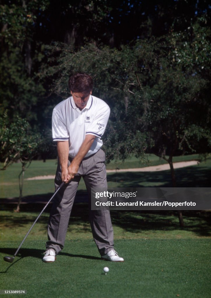 Fred Couples swing impact.