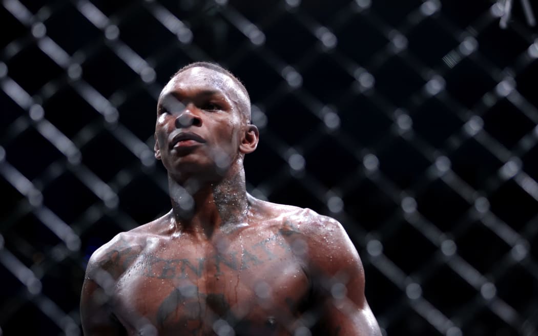 Israel Adesanya promotional shots.