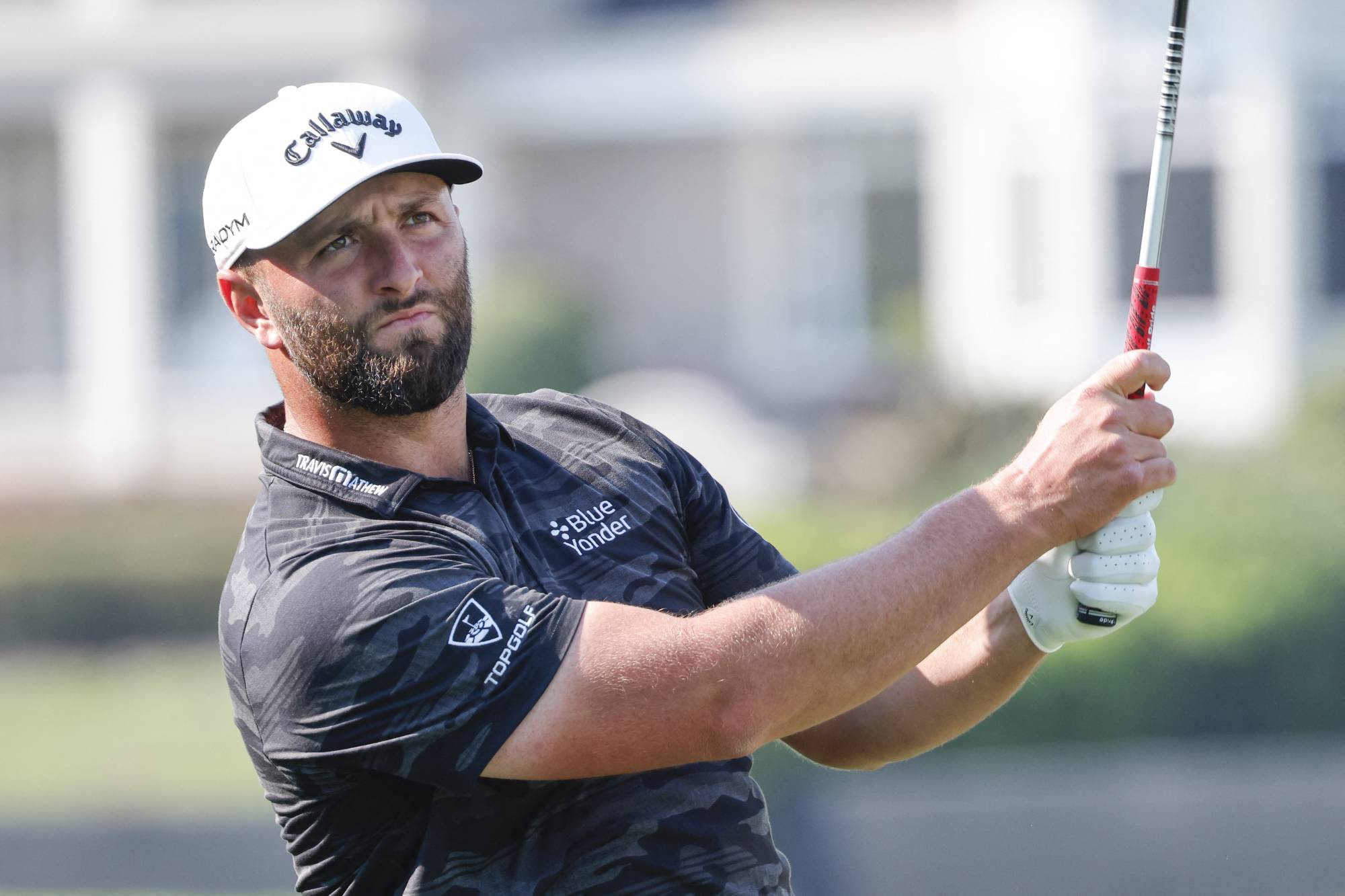 Jon Rahm golfing technique.