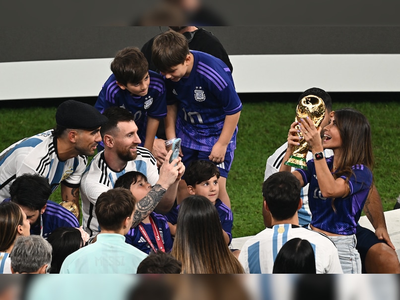 messi taking picture with fan 0015
