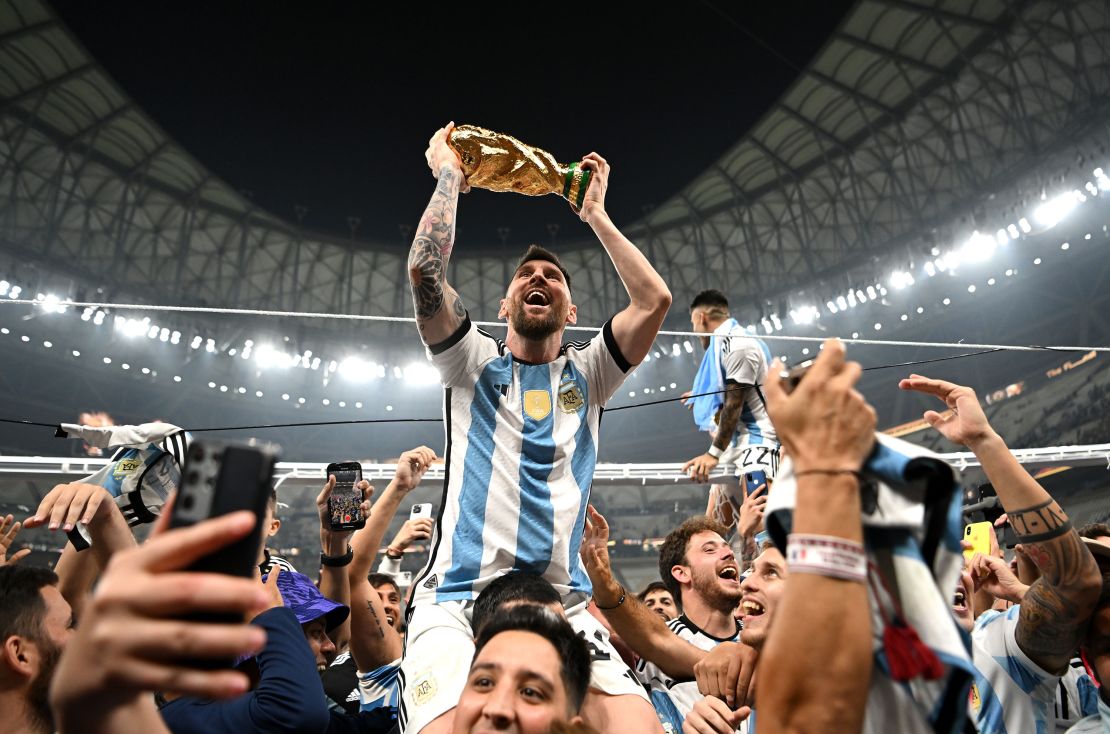 messi taking picture with fan 0016