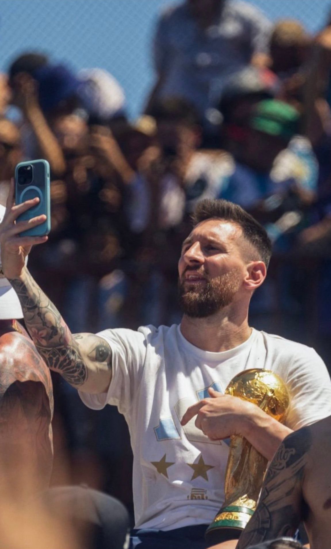 messi taking picture with fan 0058