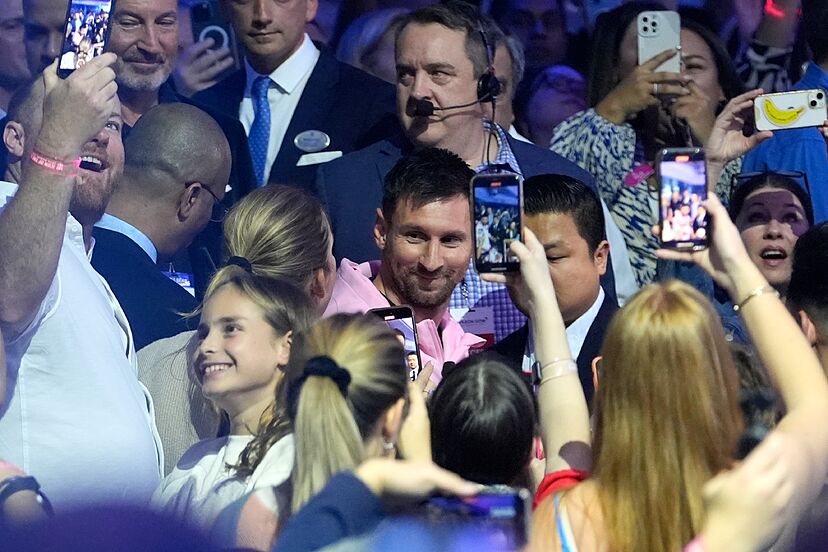 messi taking picture with fan 0061