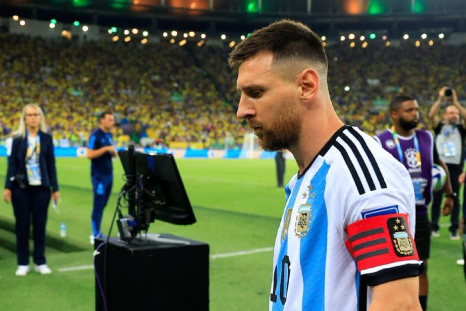 messi taking picture with fan 0083