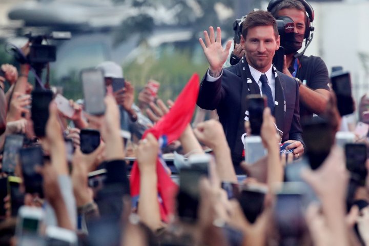 messi taking picture with fan 0098