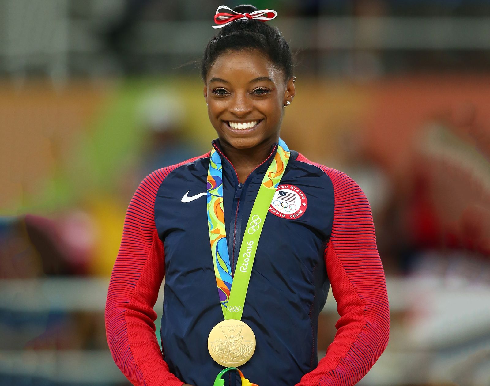 pictures of simone biles doing gymnastics