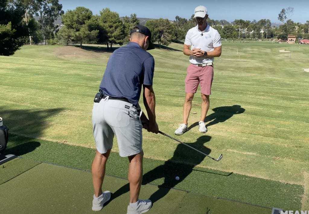 pro golf swing from behind 0041
