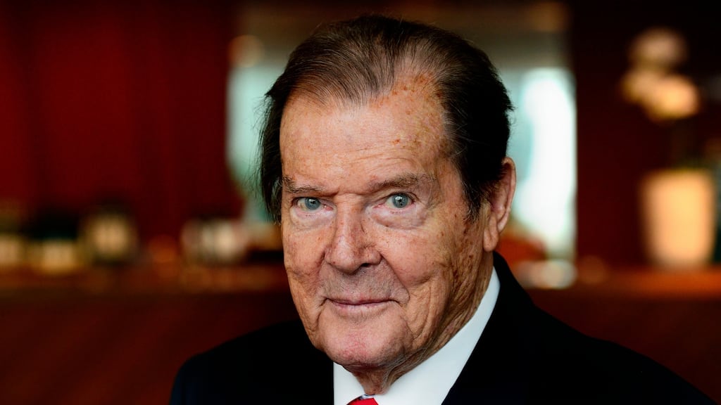 Roger Moore poses