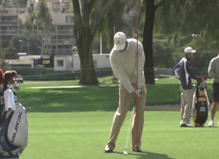 tiger woods impact position iron 0012