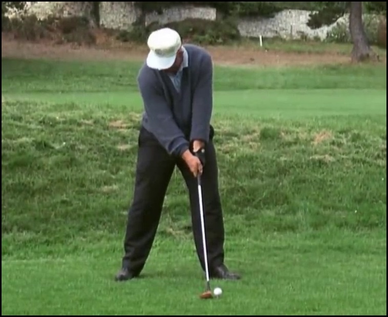 tiger woods impact position iron 0043