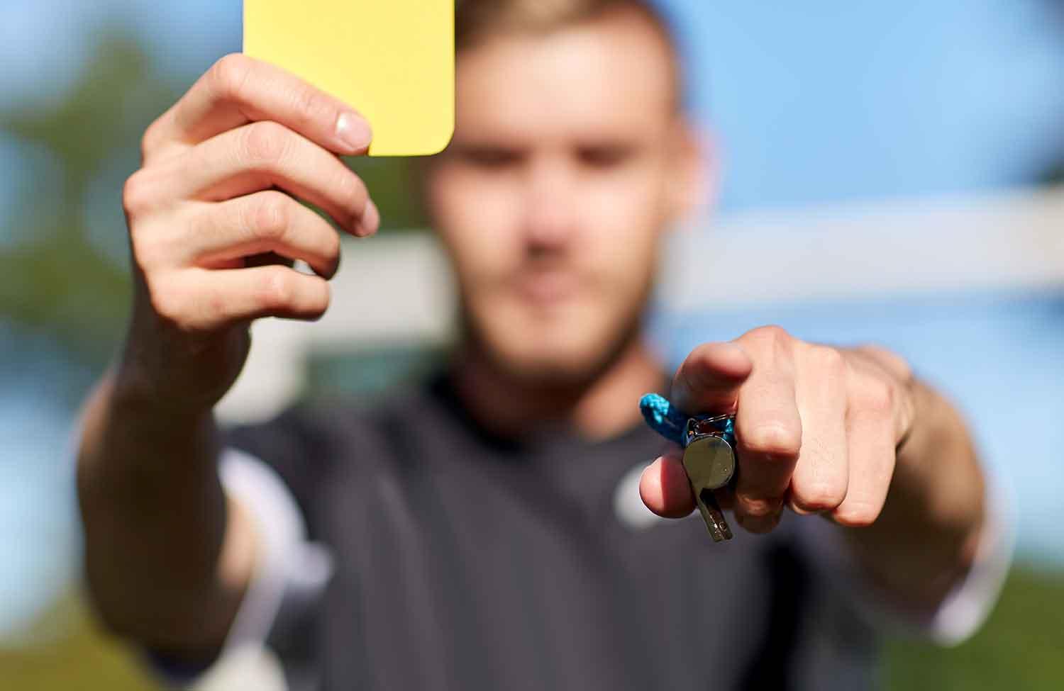 can coaches get yellow cards