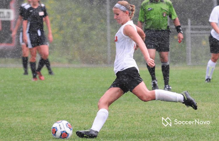 playing soccer in the rain