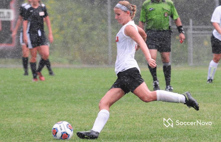 playing soccer in the rain