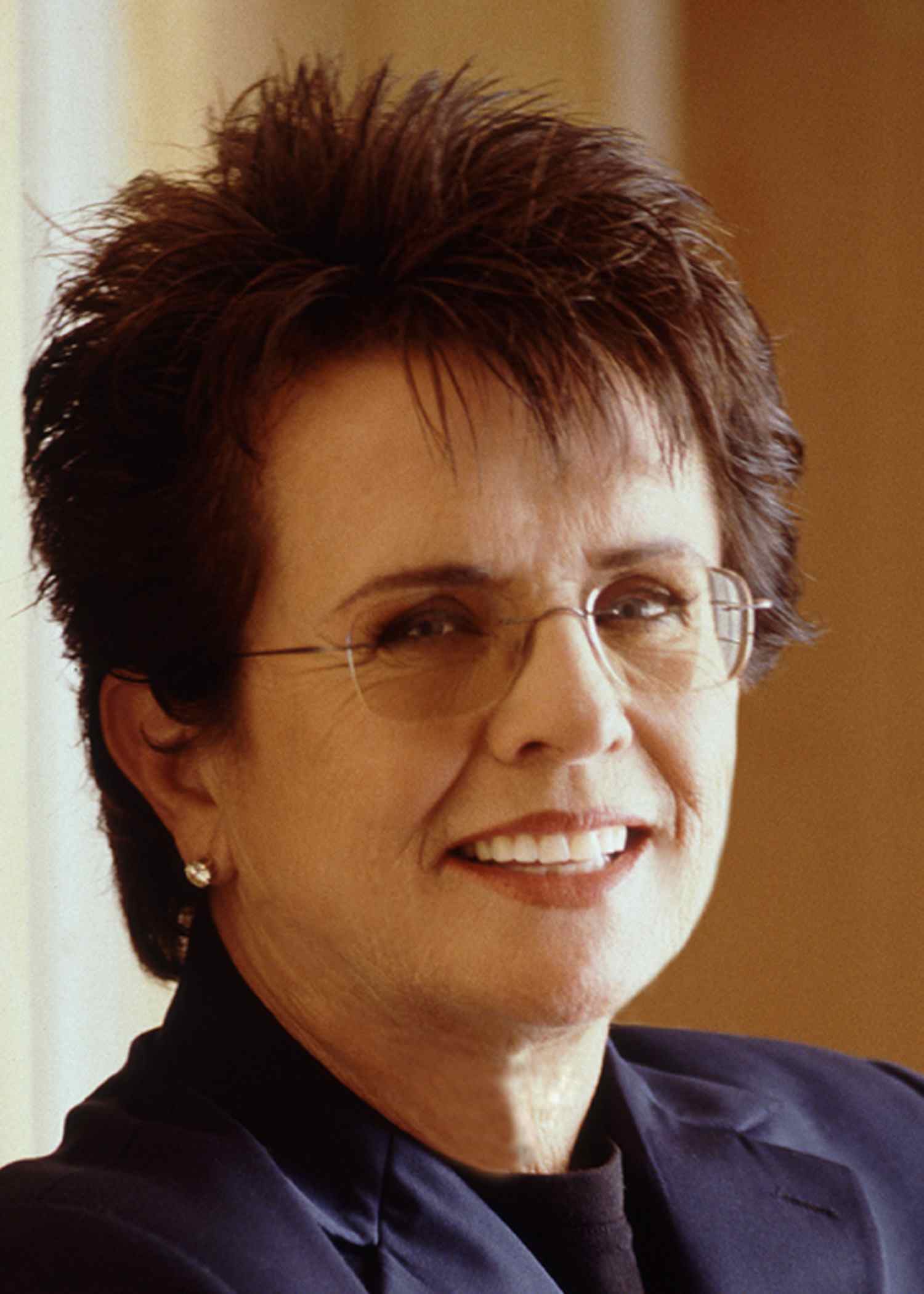 Billie jean king photos showcasing high-performance athleticism and spirit