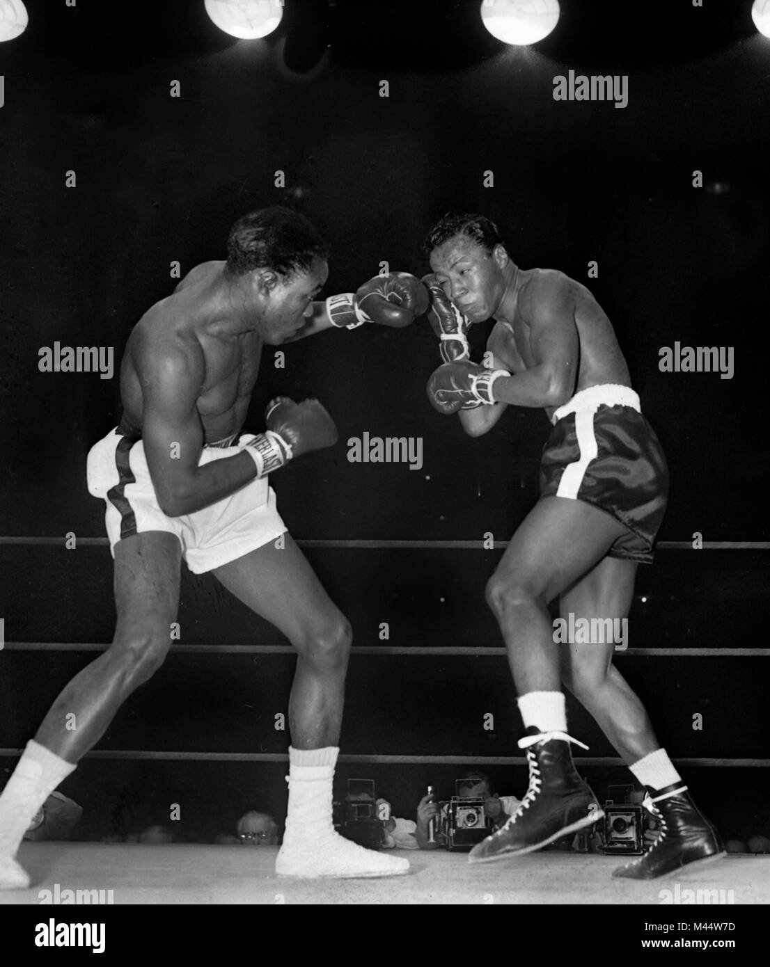 Black and white boxing photos capturing unparalleled moments of glory