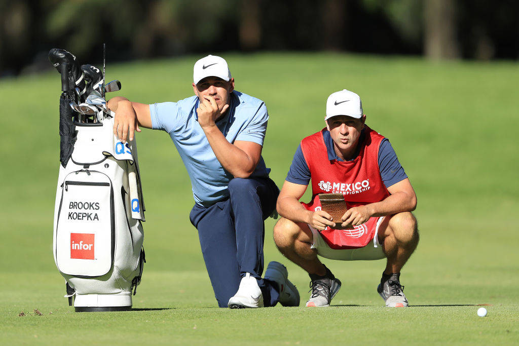 Brooks caddie leads the way to a victorious golf championship
