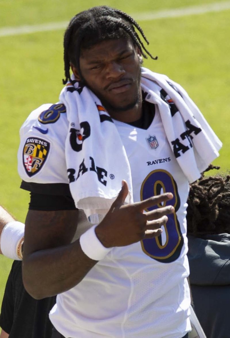**a picture of lamar jackson** showcasing his incredible athleticism and skill