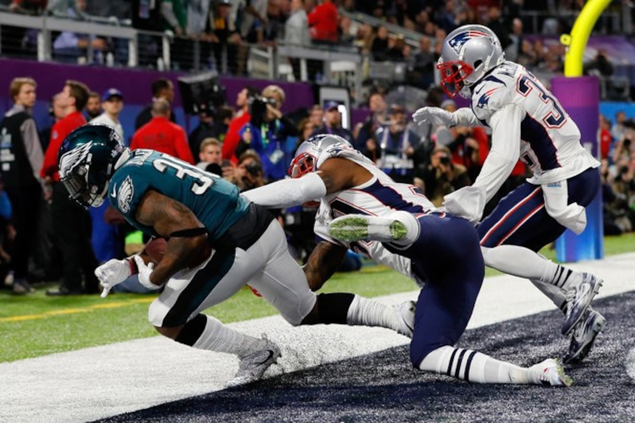 Corey clement super bowl moments in a minimalist spotlight
