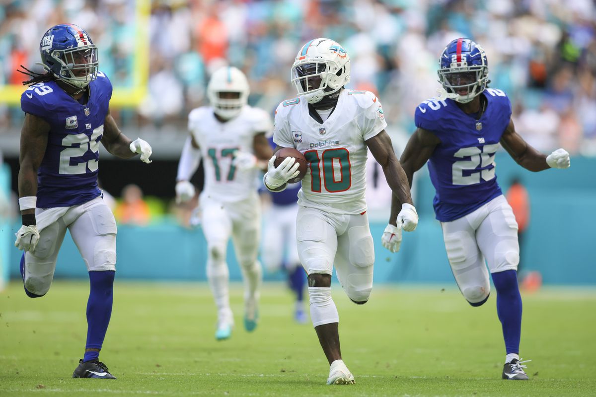 Dolphins vs giants iconic showdown in the world of sports history