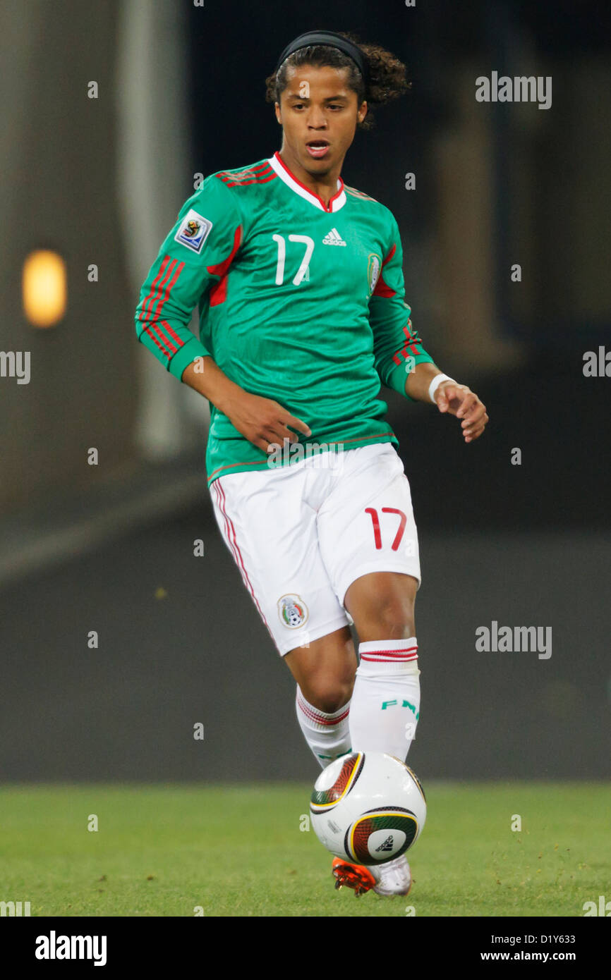 Giovani dos santos wallpaper featuring riveting moments in football