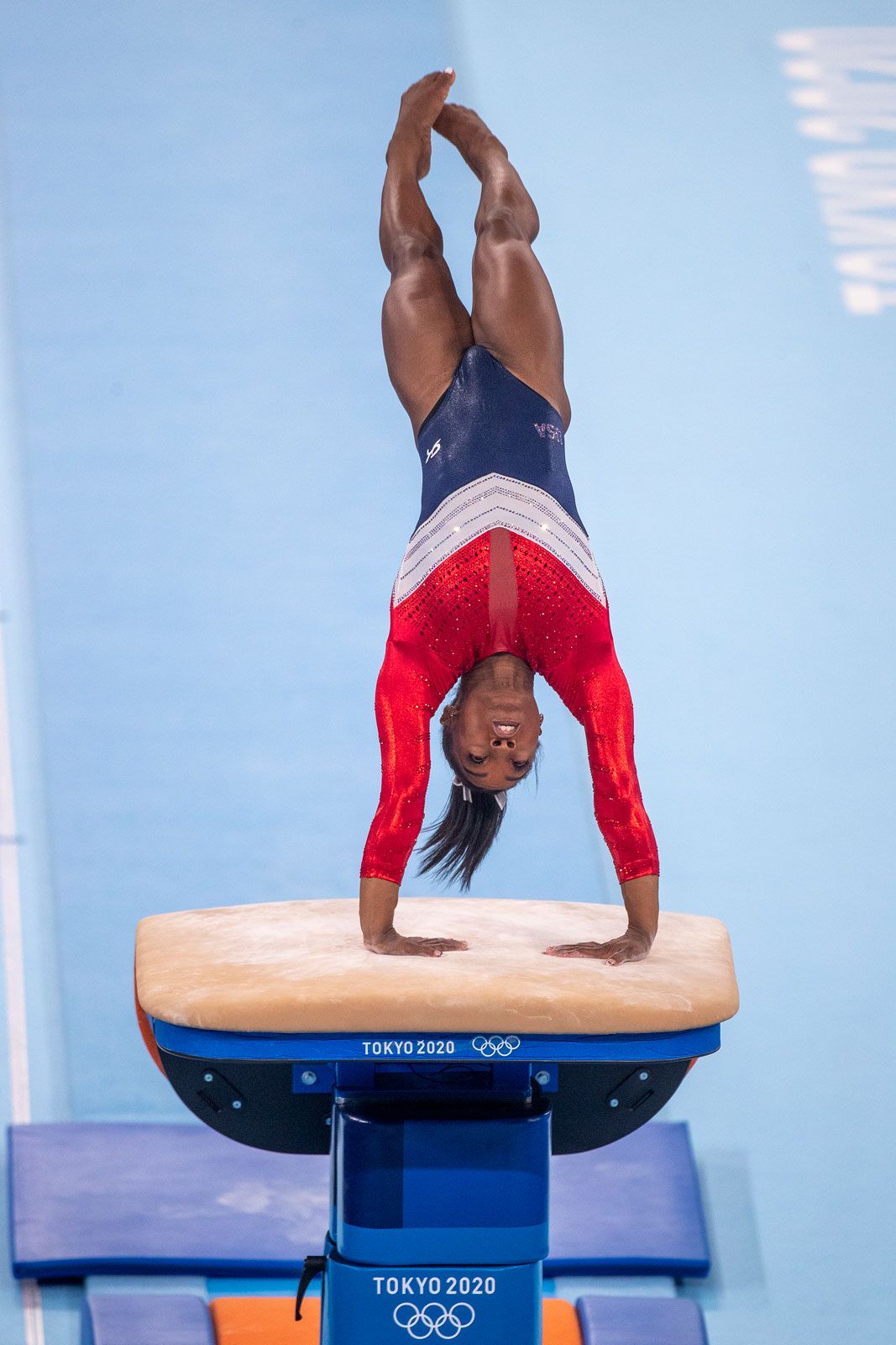 Picture of a vault in gymnastics showcasing unity in athleticism