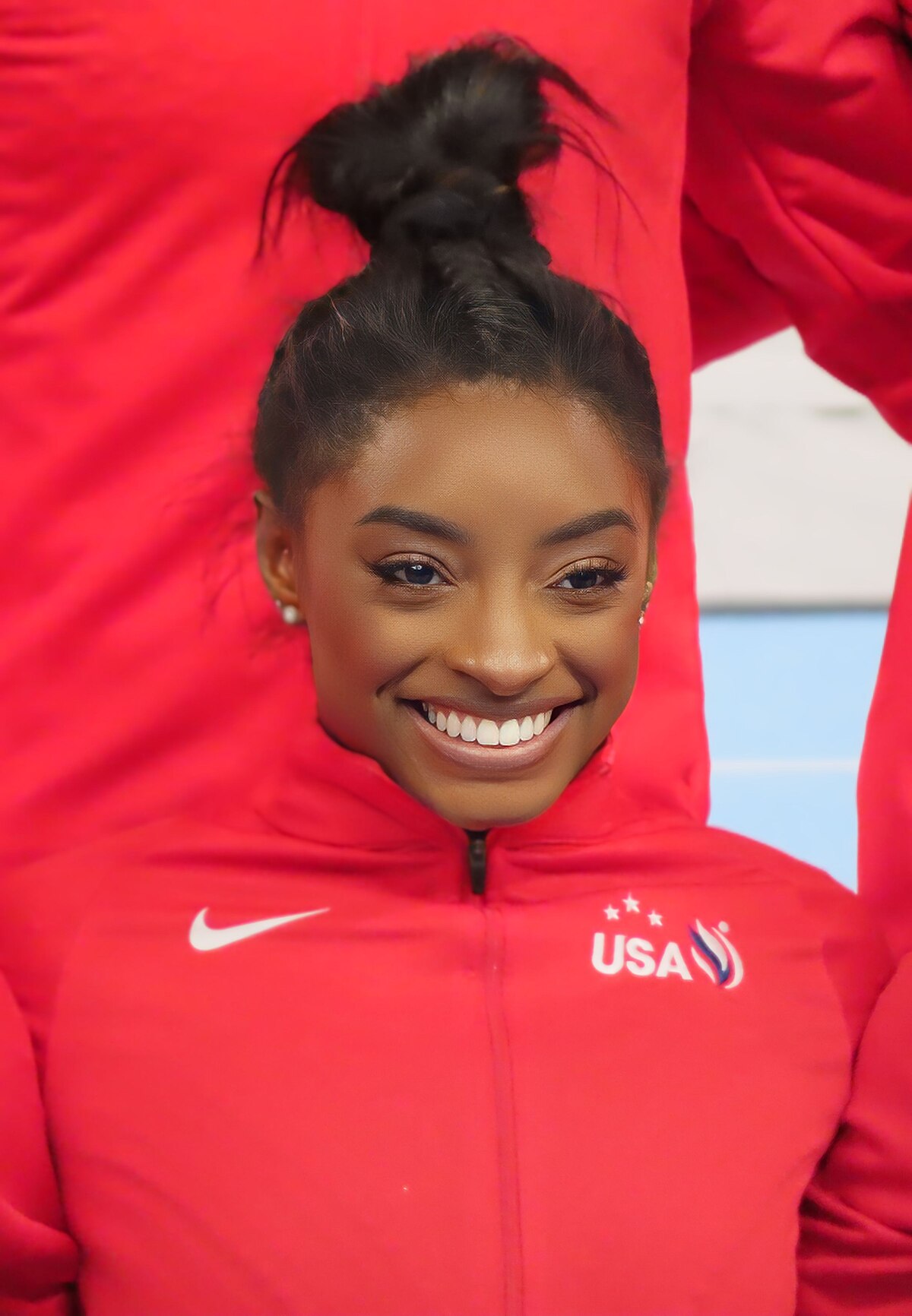 A picture of simone biles showcasing her incredible athleticism and grace