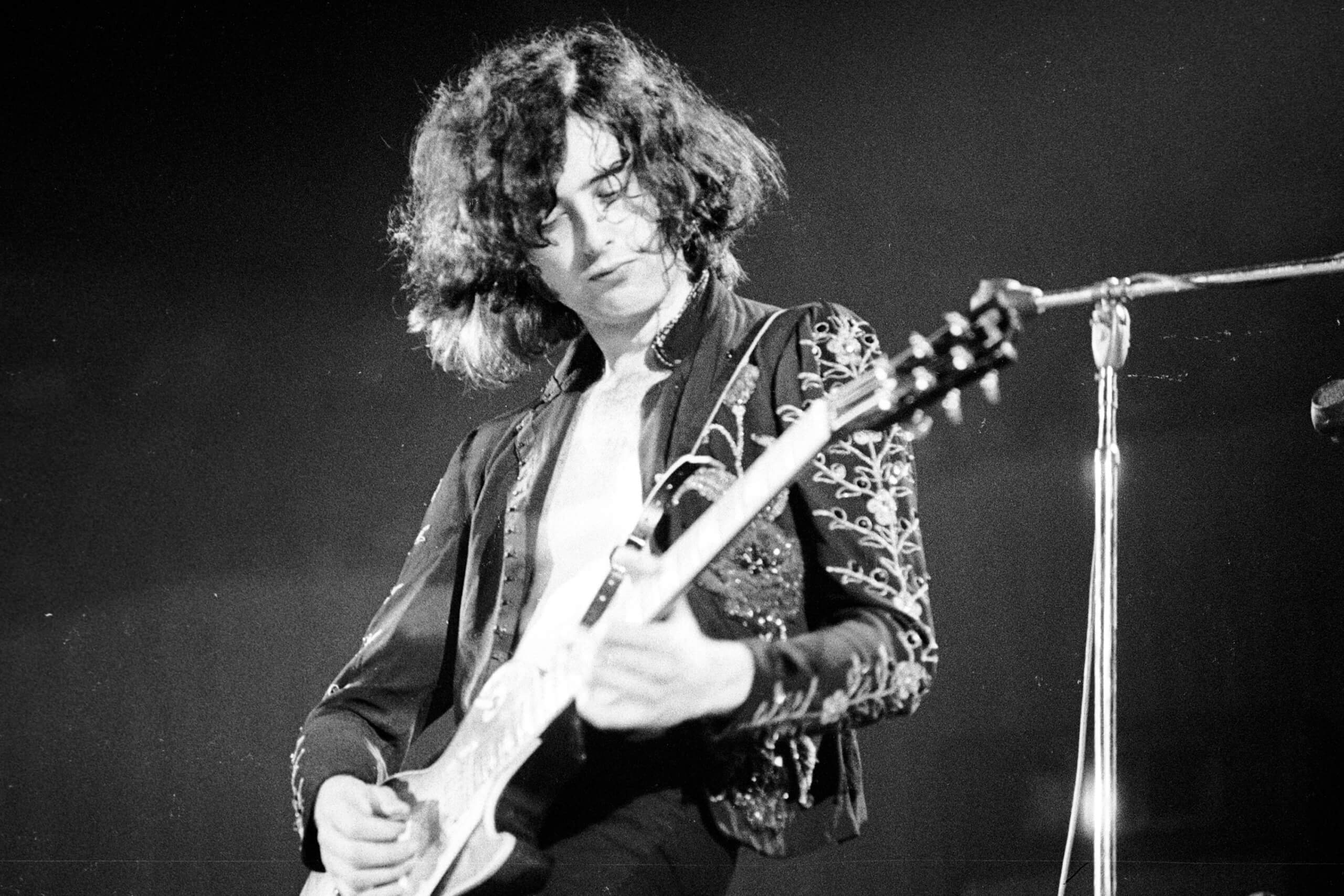 Images of jimmy page the legendary guitarist captured in time