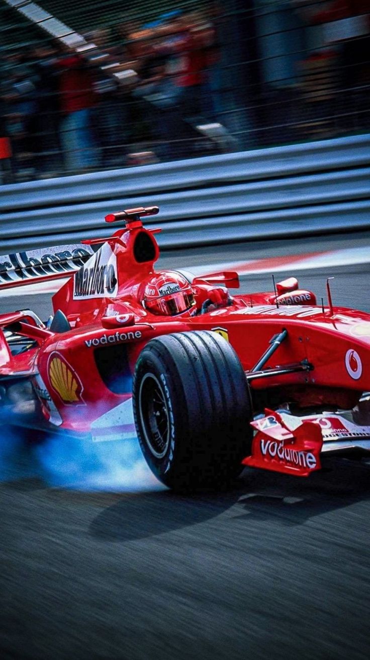 Michael schumacher wallpaper reflecting his disciplined legacy in racing