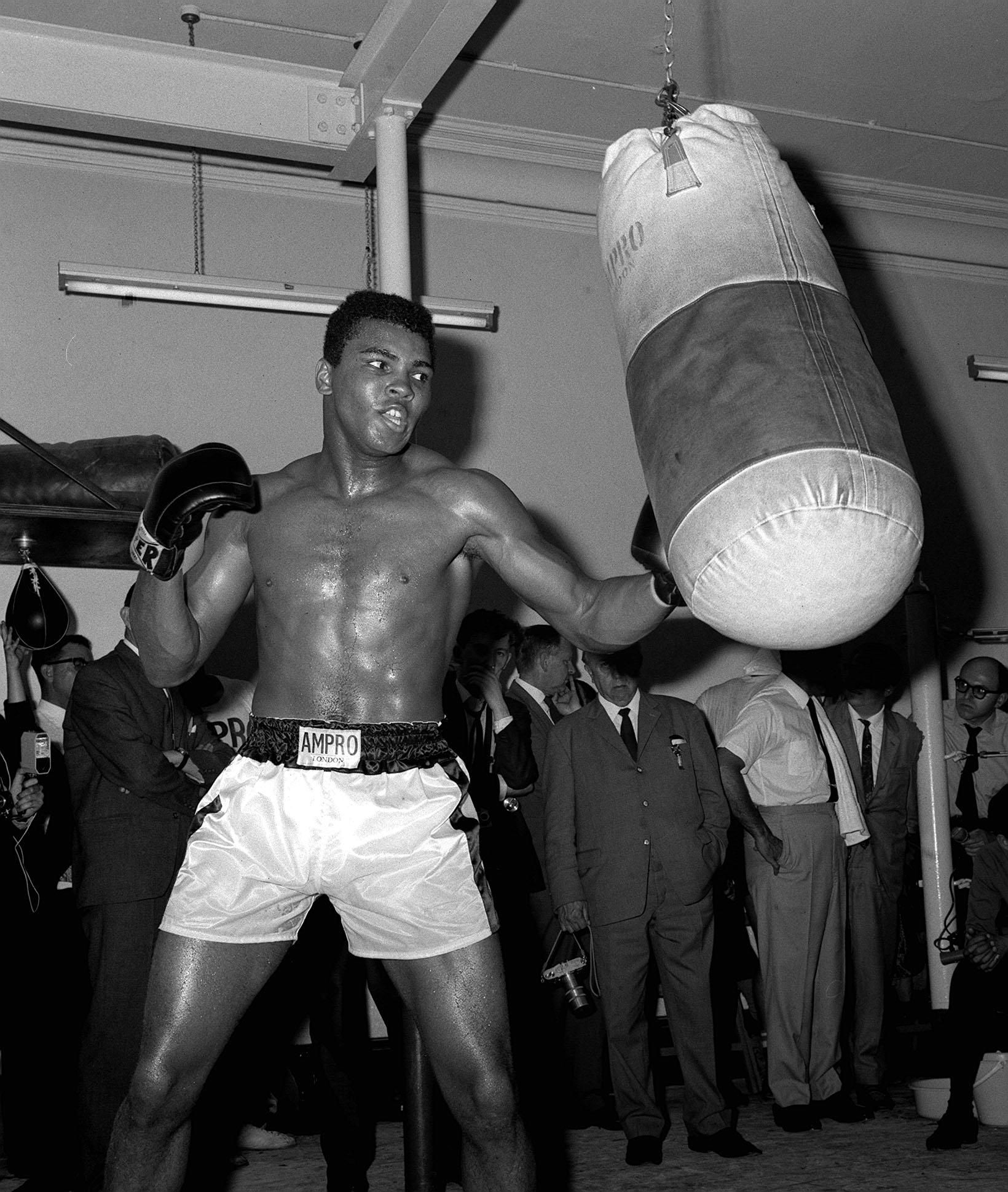 Muhammad ali shirtless showcases world-class athleticism and spirit