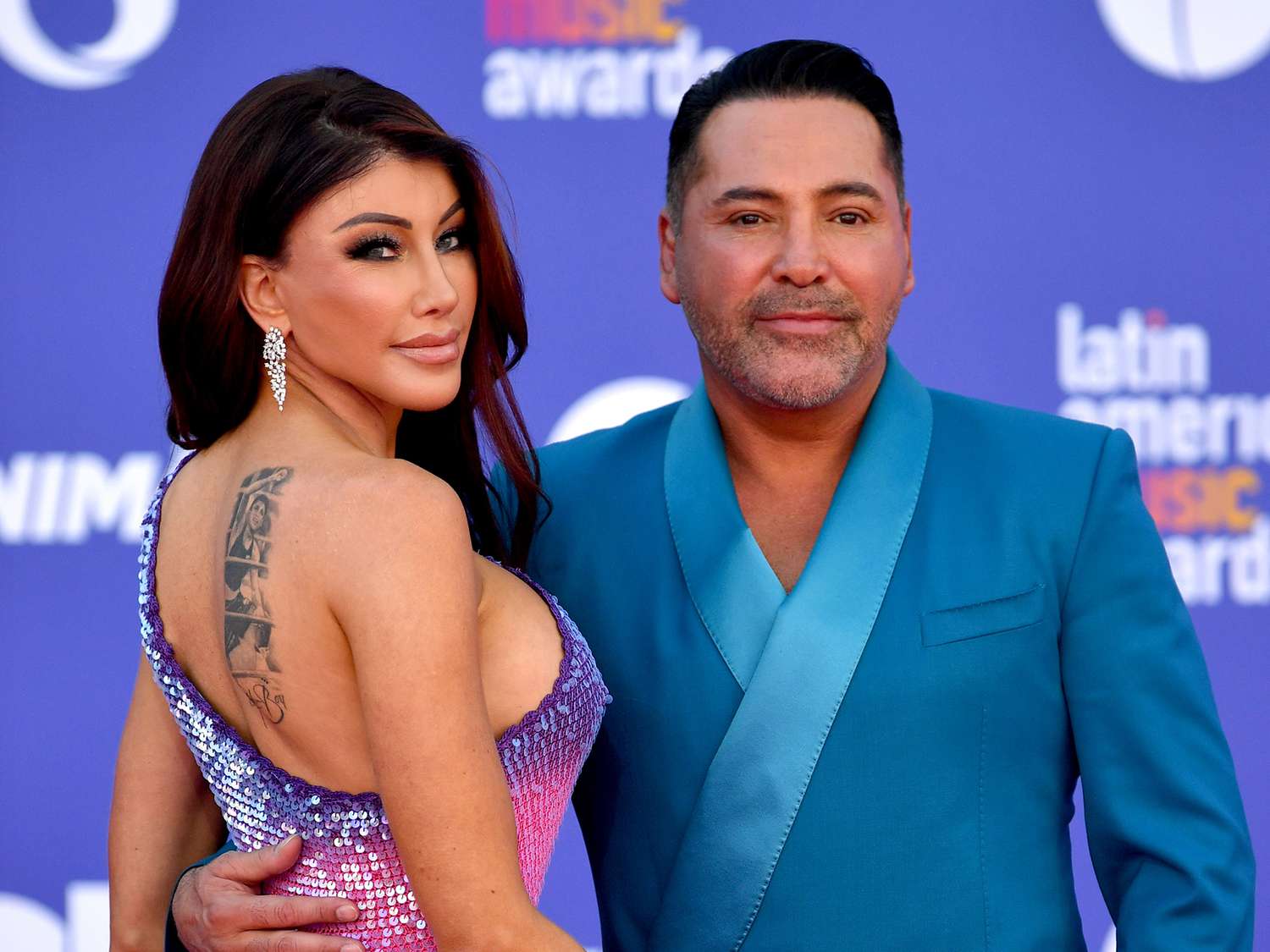 Pioneering insights into oscar de la hoya’s wife photos and life