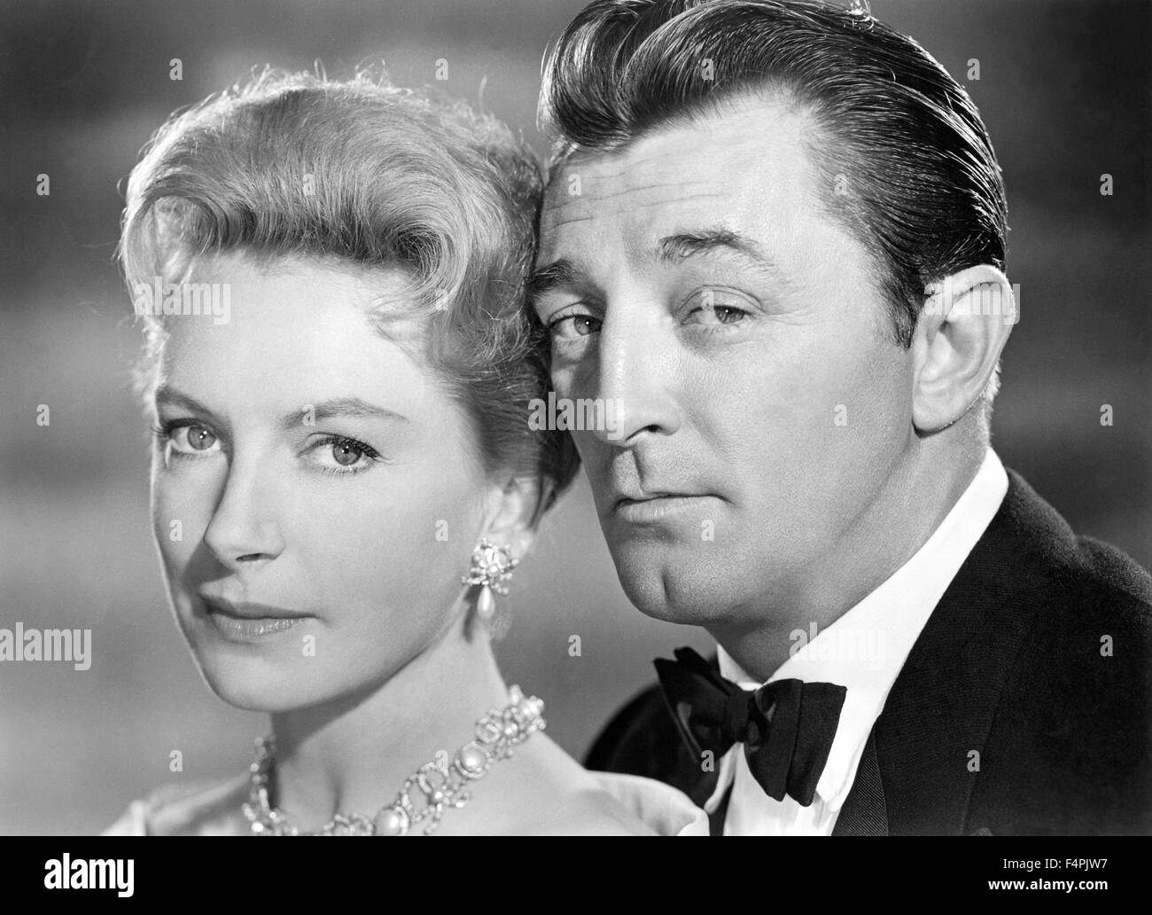 Robert mitchum and deborah kerr in sleek cinematic icons of hollywood