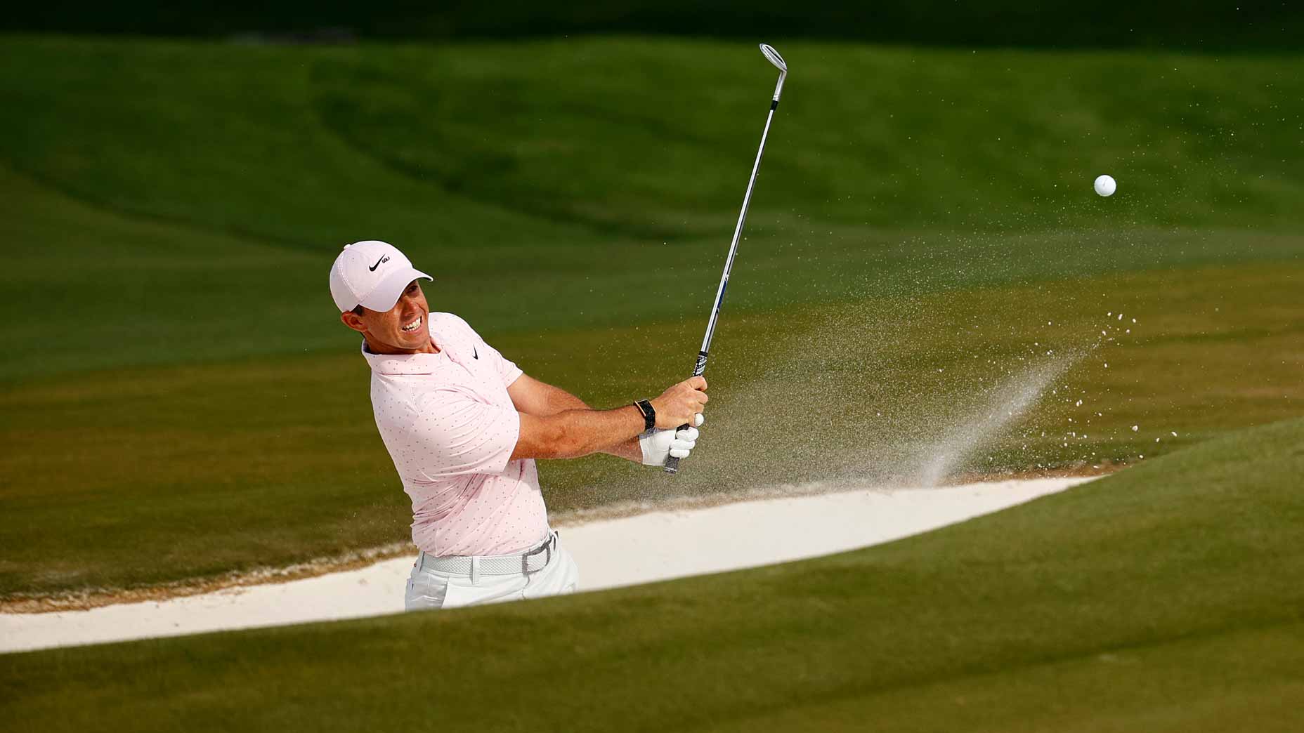 Unity in skill shines through mcilroy’s stunning bunker shot