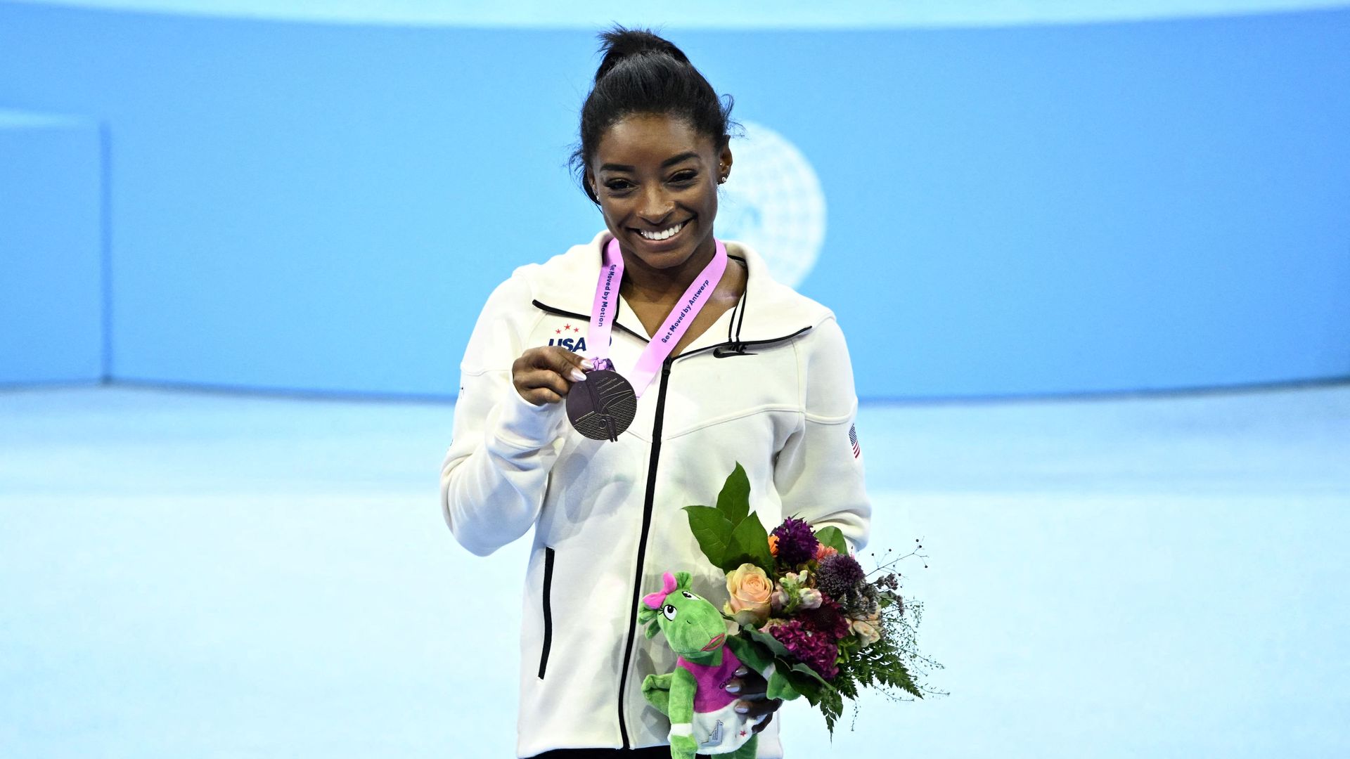 Discover the incredible journey of simone biles in antwerp