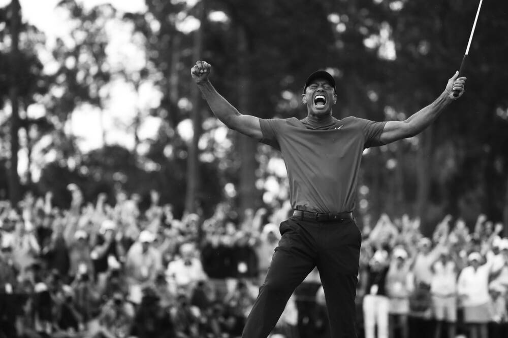 Exciting tiger woods black and white photo captures his legendary spirit
