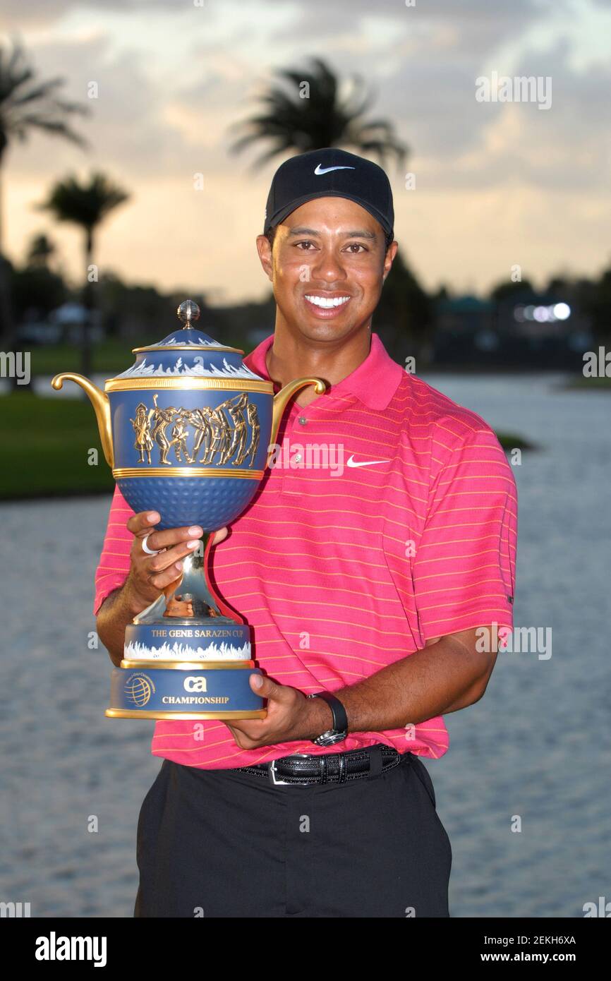 Visionary moments of tiger woods holding trophy in glory and triumph