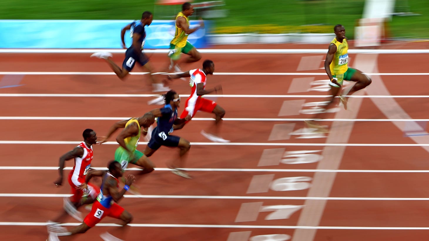 Competitive usain bolt sprinting to glory at the finish line today