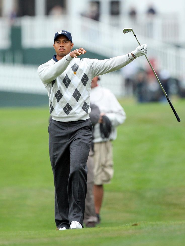 Vintage tiger woods wallpaper focused on iconic golfing moments