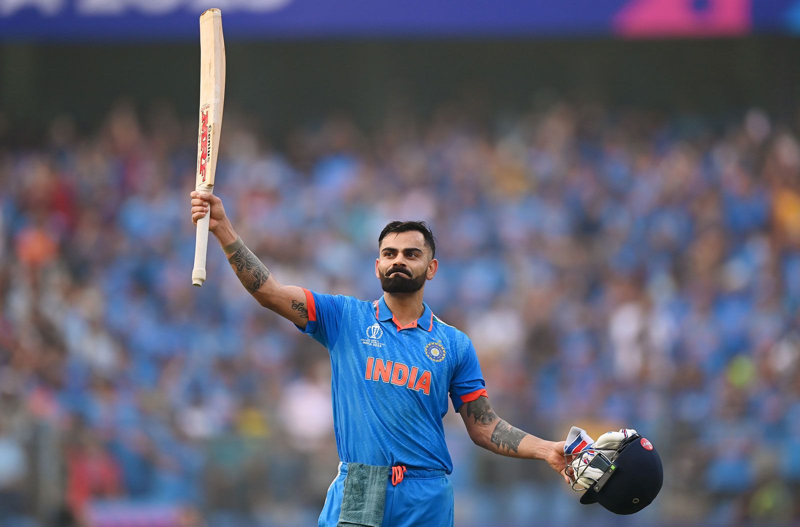 Virat kohli images showcasing triumphant moments in cricket history